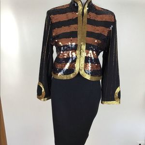 Semplice sequins sweater jacket . The colors are copper black and gold size M.